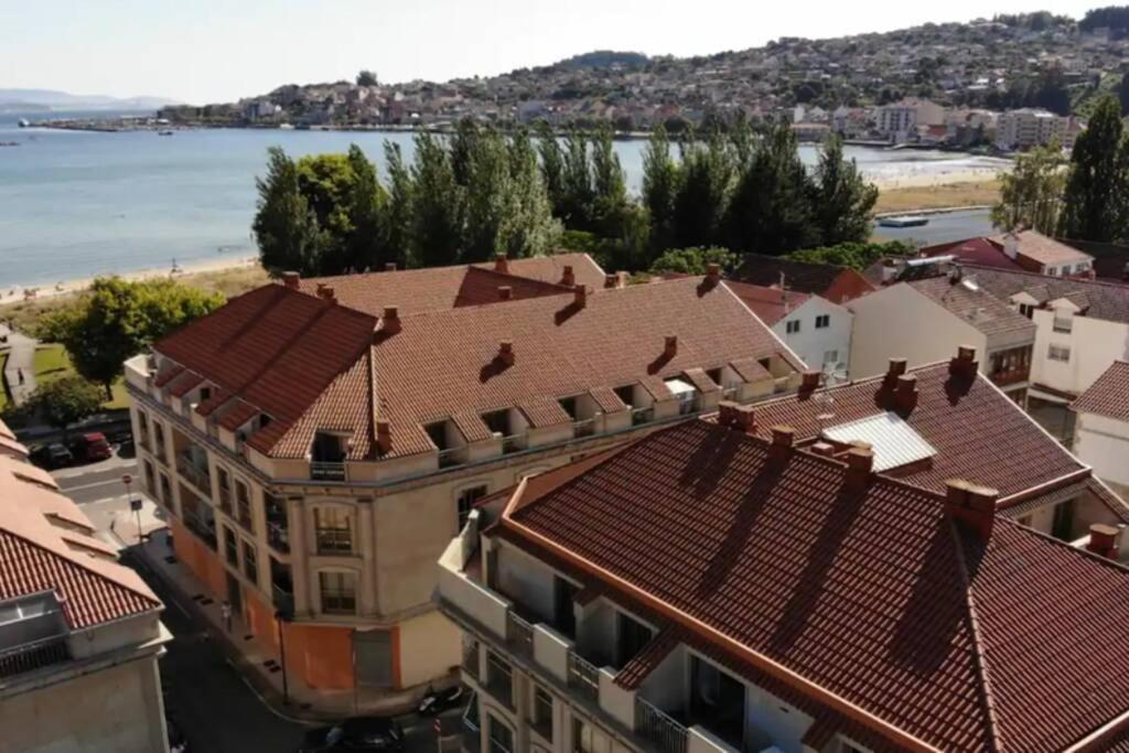 Апартаменты Primera Linea De Playa Rias Baixas, Моания Экстерьер фото